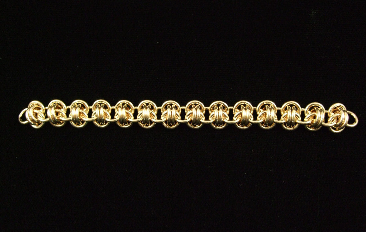 Gold-filled Barrel Weave chainmaille bracelet chain on black velvet, Urban Maille