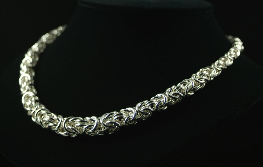 Bold Graduated Byzantine Necklace in silver chainmaille on a black bust, Urban Maille