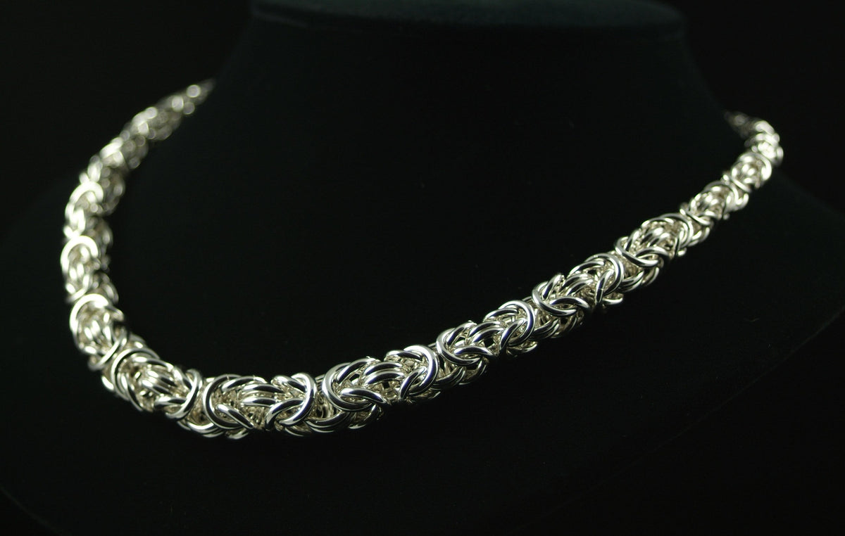 Bold Graduated Byzantine Necklace in silver chainmaille on a black bust, Urban Maille