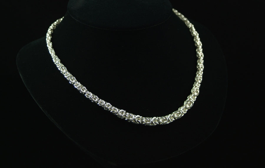 Delicate Graduated Byzantine Necklace in silver chainmaille on a black bust, Urban Maille