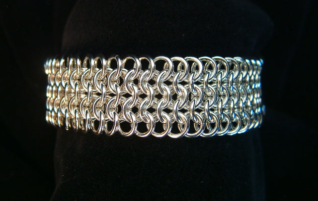 Wide sterling silver European 4-in-1 chainmaille bracelet on a black velvet display, Urban Maille