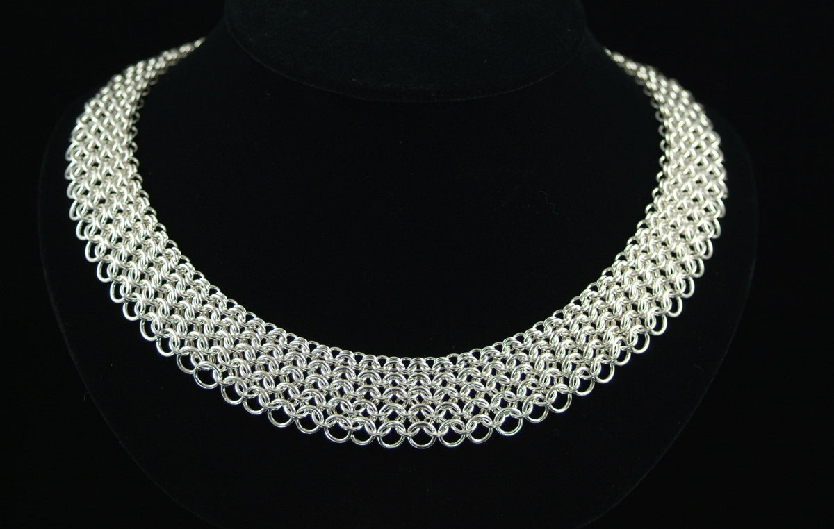 Graduated European 4-in-1 Collar in silver chainmaille on a black bust, Urban Maille