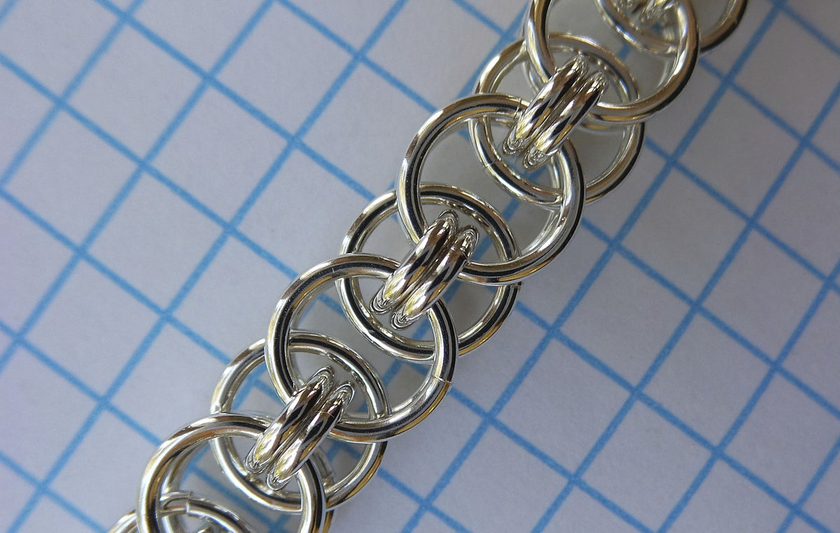 Parallel Chain chainmaille in sterling silver on graph paper